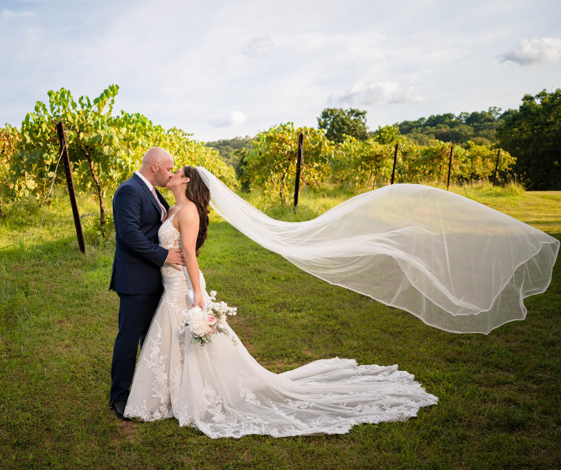 Couple in vineyard by lake of the Ozarks photographer Mitchell Bennett Photography