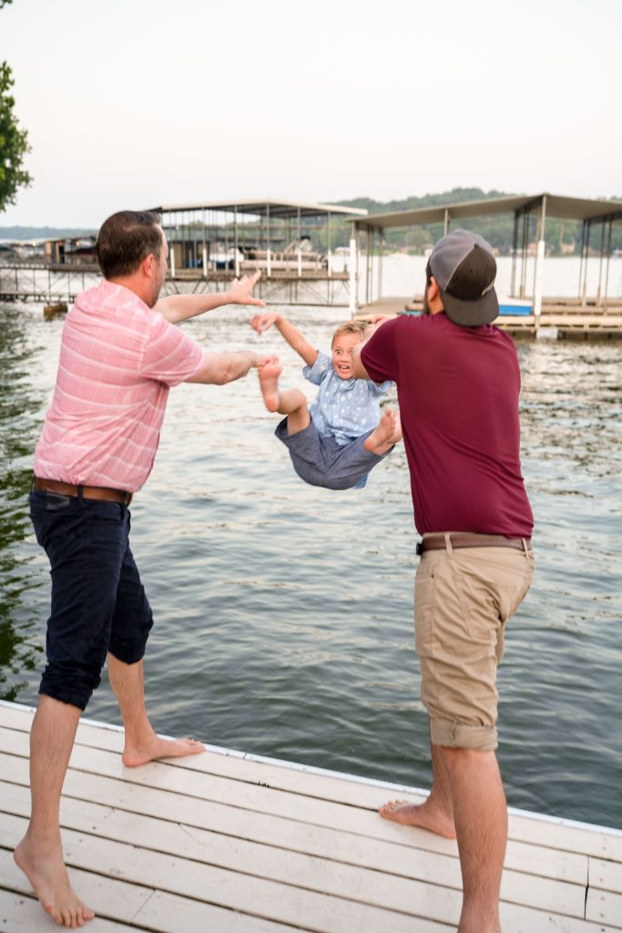 boy being thrown in the lake of the Ozarks