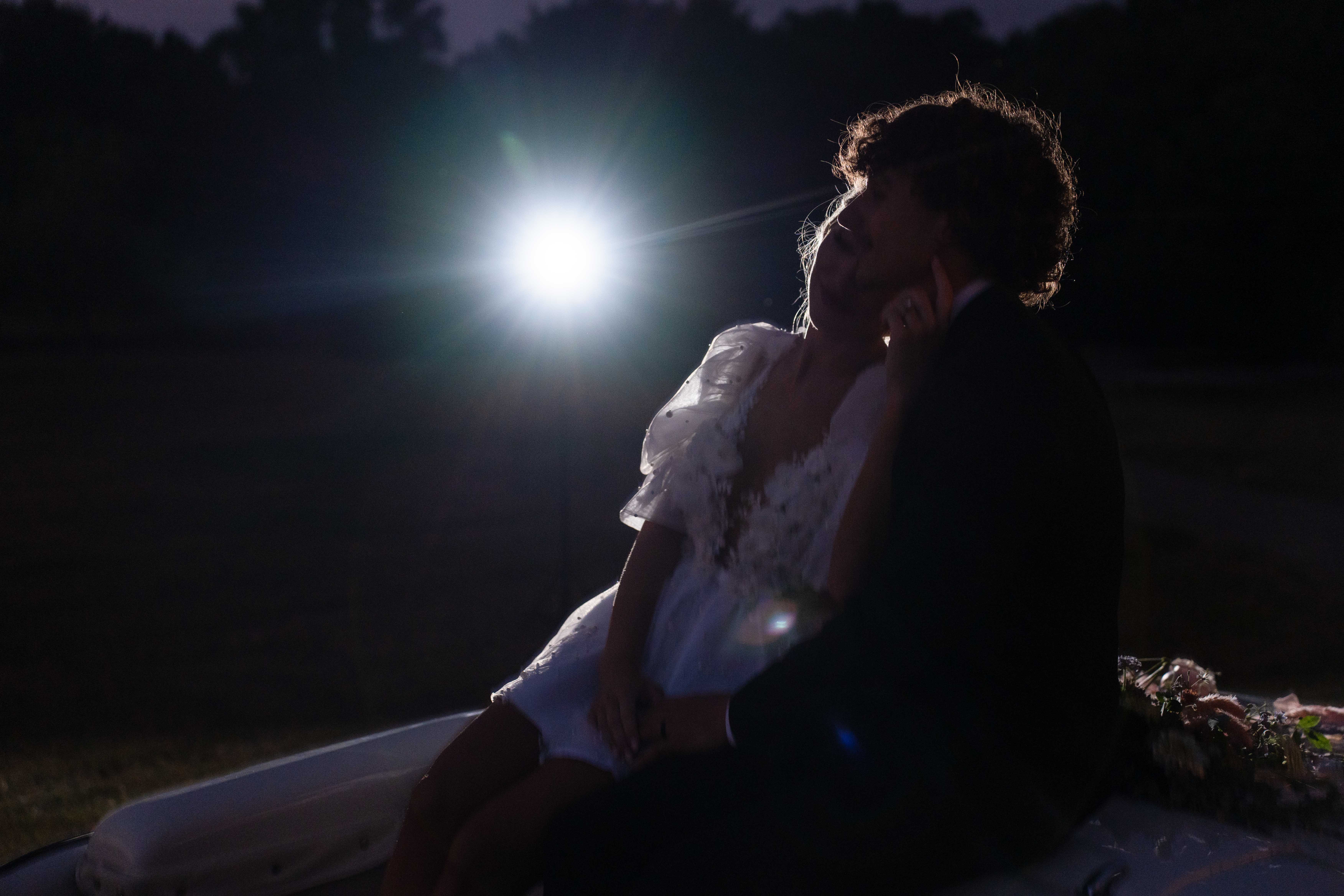 silhouette of a wedding couple photo