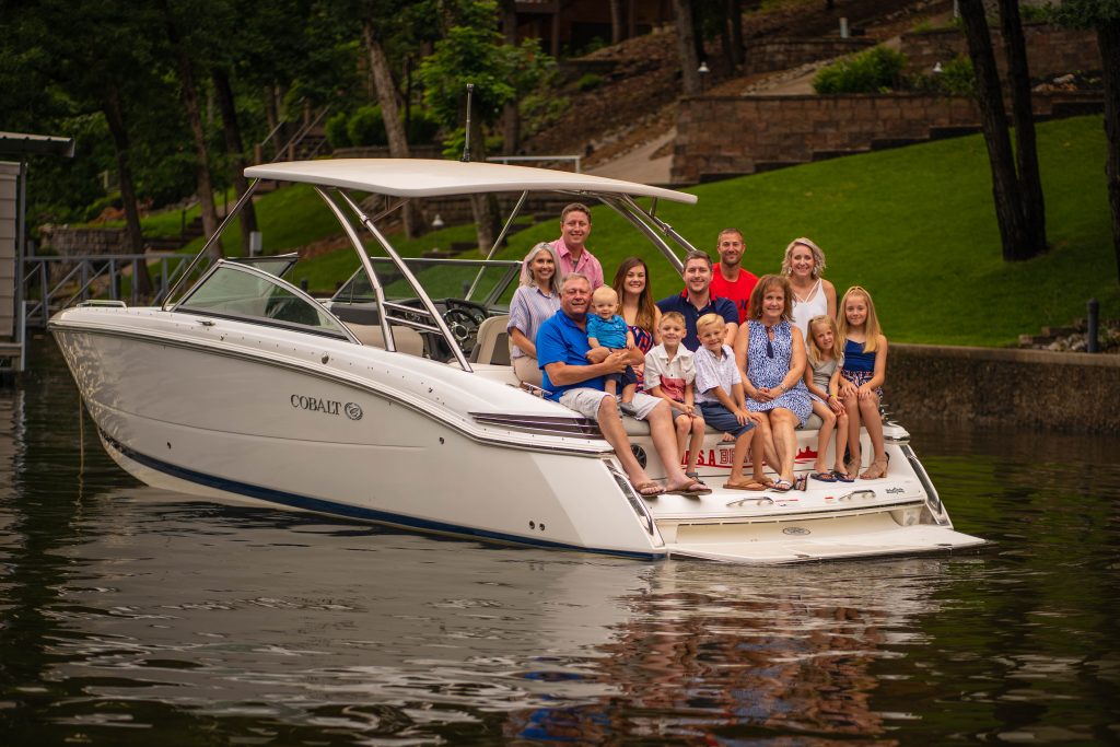 professional family photograph on a boat at the lake of the Ozarks