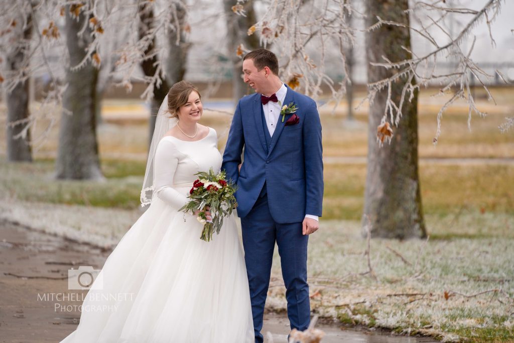Wedding couple in ice storm at Lake of the Ozarks by Mitchell Bennett Photography