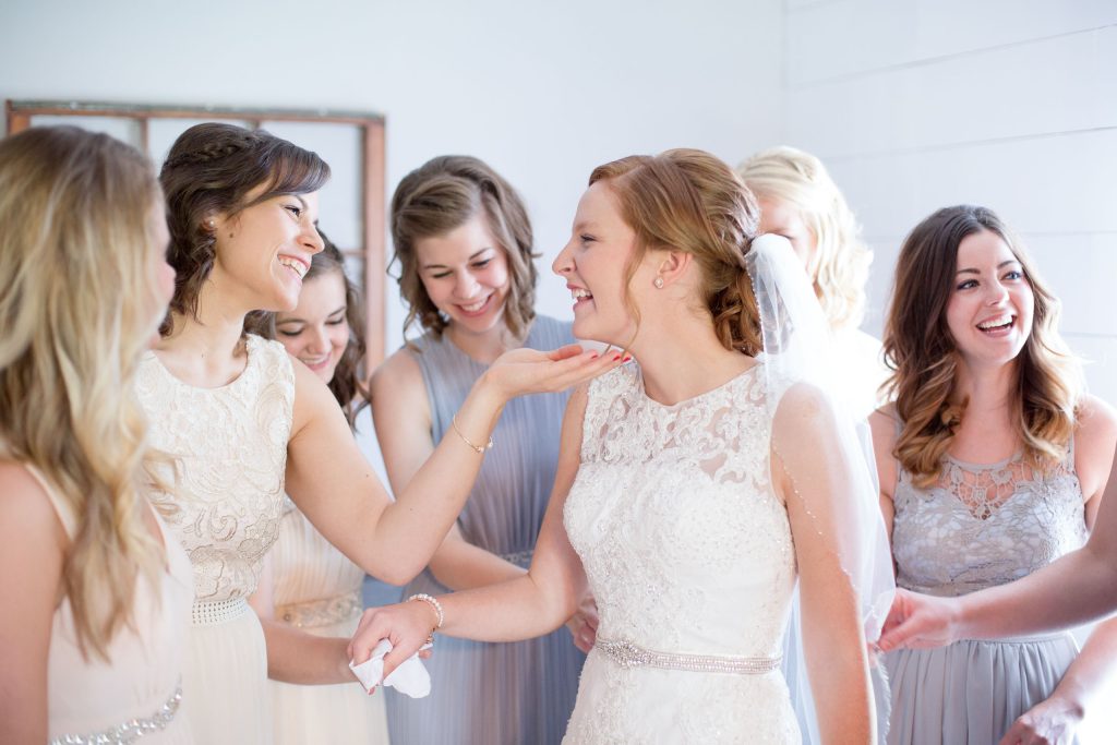 bride first look with bridesmaids by Lake of the Ozarks Wedding Photographer Mitchell Bennett Photography