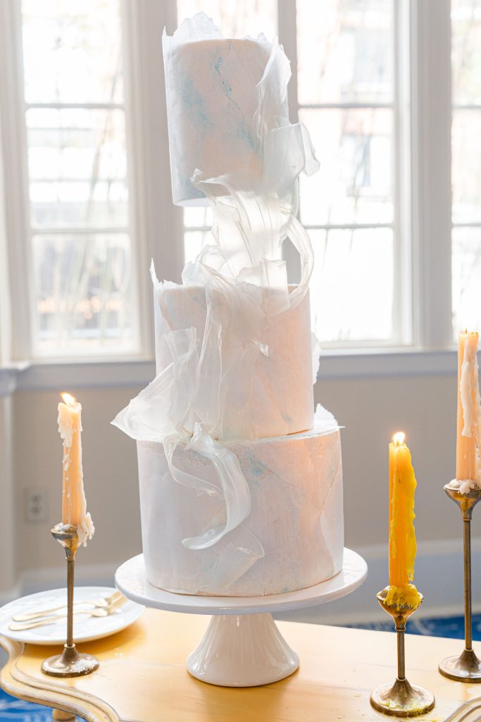 white wedding cake by Lake of the Ozarks Wedding Photographer Mitchell Bennett Photography